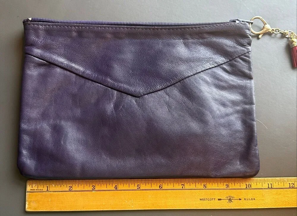 Purple leather envelope clutch with pink tassel zipper